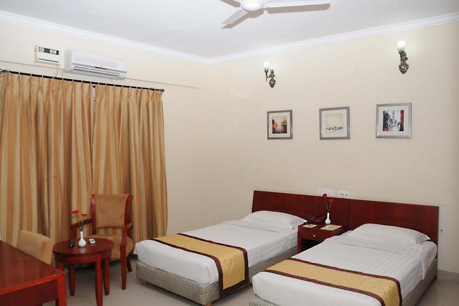 Ivory Inn Bengaluru Pokój zdjęcie